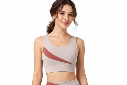 Beige sports bra with a red diagonal stripe on a white background