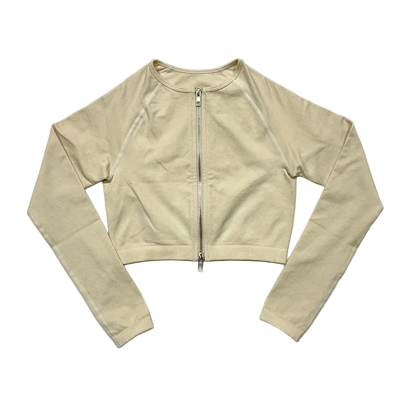 Beige cropped jacket with a zipper on a white background